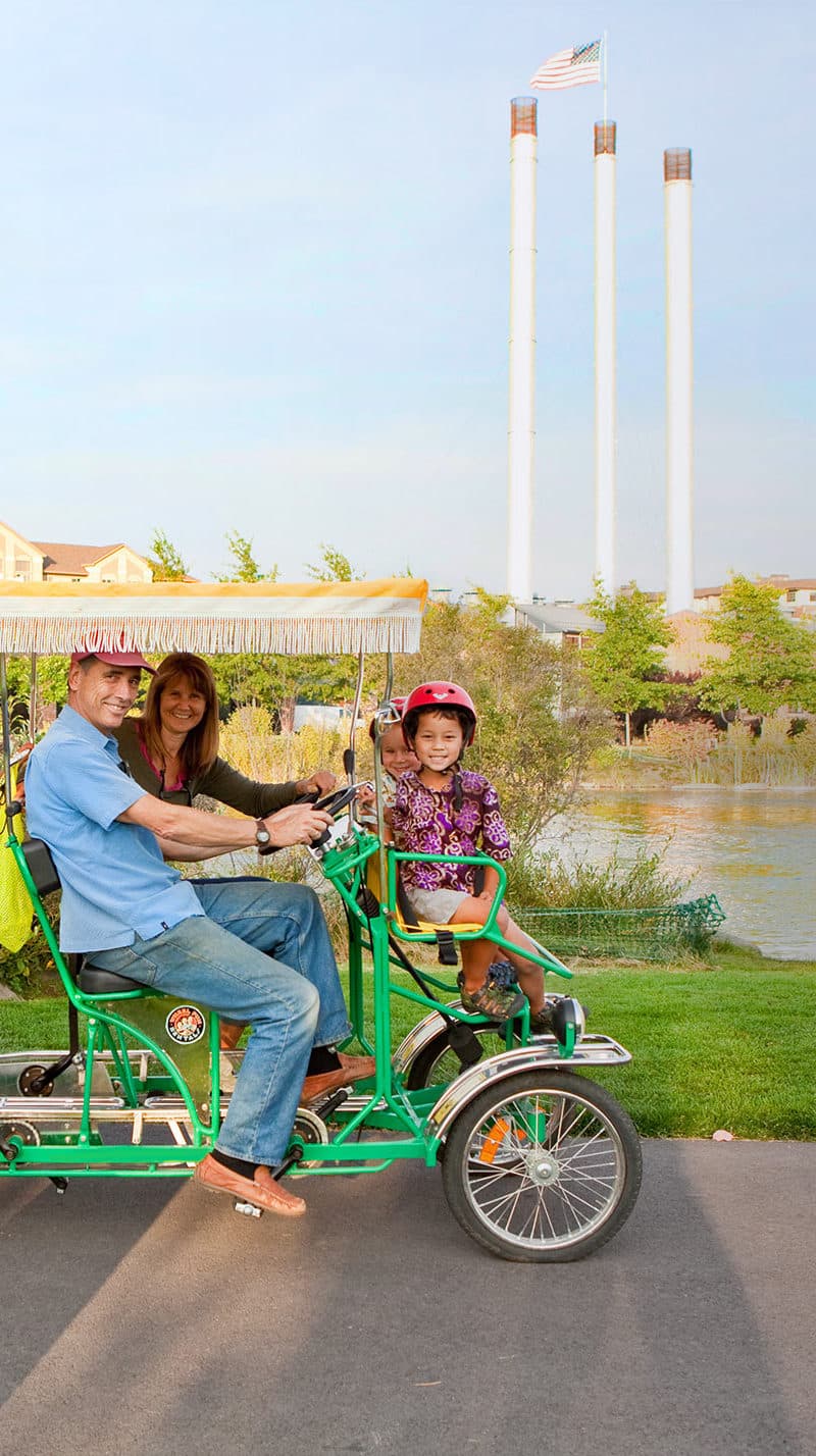 Rent a Surrey Bike with your friends or family and ride around Old Mill Historic District